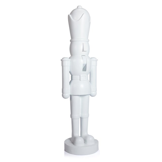 Elevate your holiday décor with this striking minimalist resin nutcracker, standing an impressive 40 inches tall. With...