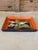 A wonderfully colorful vintage papier-mâché decorative tray featuring a whimsical zebra surrounded by tropical foliage...