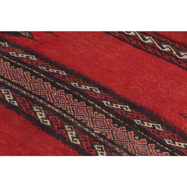 Handwoven in wool, circa 1950-1960, this 2x5 vintage Afghan tribal kilim, is a collectible tribal piece that may have been...