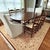 Antique Belgian Dining Table circa 1900 This stunning oak table easily goes from round to oval with the addition of one...