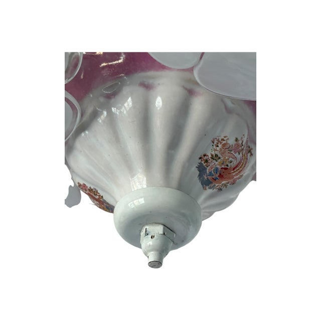 This vintage Italian chandelier from the 1980s features elegant round white Murano glass flowers, arranged in a sculptural...