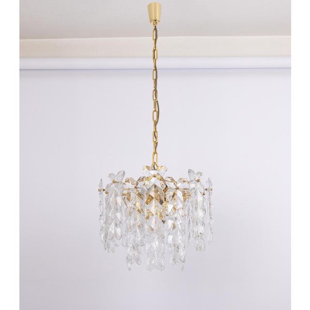 Wonderful brass chandelier comprises crystal polished glass pieces on a brass frame. It’s made by kalmar (series: palma),...