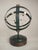 Rare educational scientific instrument representing the solar system This Planetary Armillary Sphere features a minimalist...