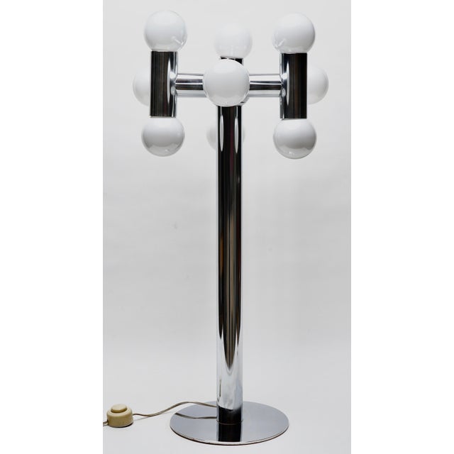 Stunning 9 bulb chrome table lamp by Robert Sonneman. A eye catching piece anywhere in the house or office.