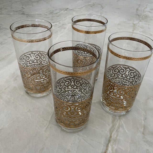 Lovely set of 4 vintage mid-century modern highball glasses by Georges Briard. These signed glasses each measure 5.5” tall...