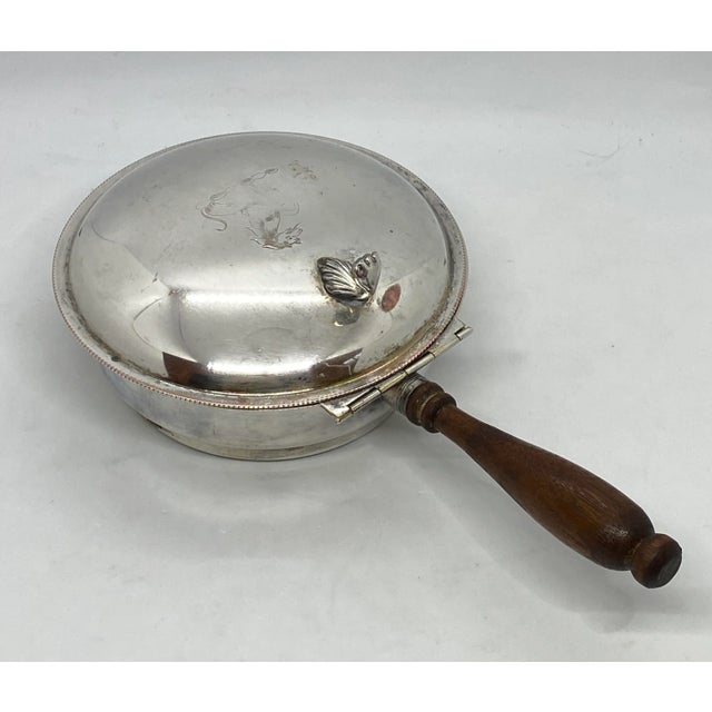 Add a touch of elegance to the table with this 1940's Sheffield Silver Plate Silent Butler! This Butler was made to...