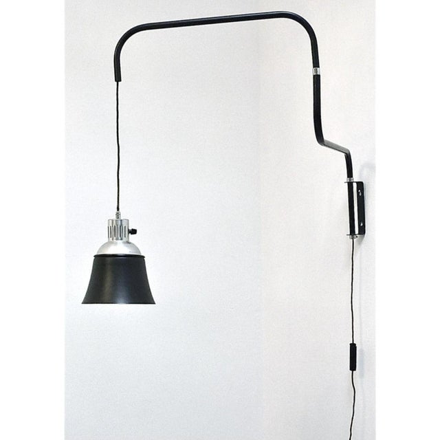 Model 830 Extendable Wall Lamp in Black by Heinrich Siegfried Bohrmann for Kandem, 1960s, in Good conditions. Designed...