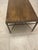 This amazing piece from Baker Furniture has an Industrial Elegance: It blends a warm, textured wood top with a structural...