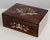 A 19th Century French Napoleon III marquetry box made of rosewood veneer with fine mother-of-pearl and brass inlay. The...