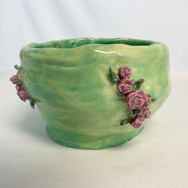 This is a wonderful piece of Americana Folk Art hand crafted pottery. It’s free-form crafted in a unique shape. The artist...