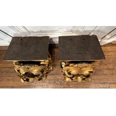 20th Century architectural brackets with bold scrolls, likely from Latin Ameria. Stunning Giltwood with exposed red bole,...