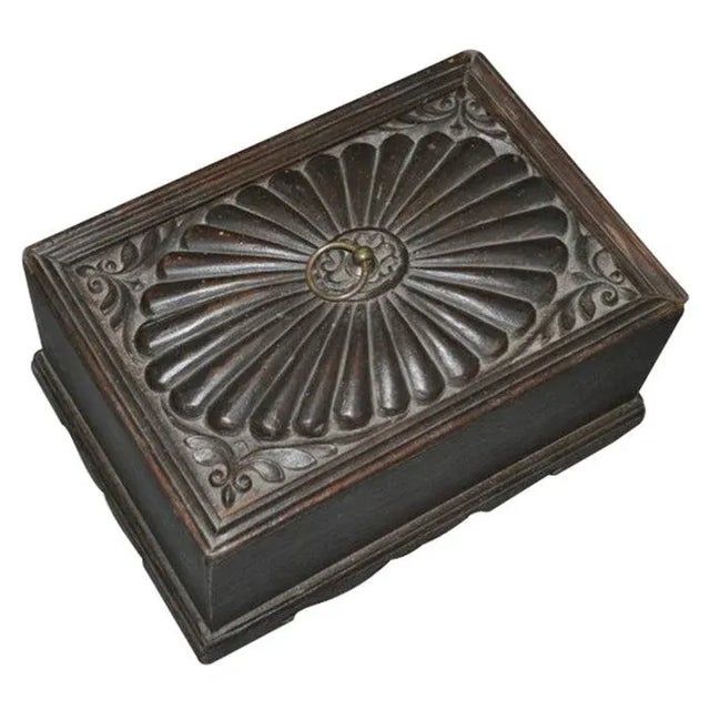 Dimensions: 11" W x 8" D x 5" H This vintage, hand carved box with a sliding lid comes from India. Cash Boxes or merchant...