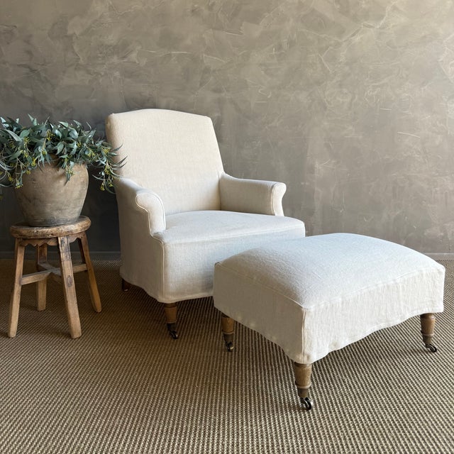 Our Alma Ottoman features a tailored linen slipcover that adds a touch of relaxed sophistication, perfectly complemented...