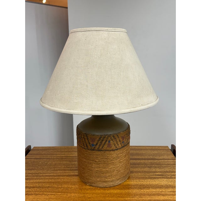 Design Plus Gallery presents a Rope Textured Table Lamp from the Mid 20th Century. The jug shaped lamp has a fine texture...