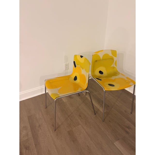 A striking pair of vintage Finnish chairs by Piippo Oy, likely from the 1980s–1990s, featuring a bold Marimekko-inspired...
