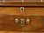 An English walnut flip top sideboard from the 19th century with faux drawers, four lower ones and reeded side posts....