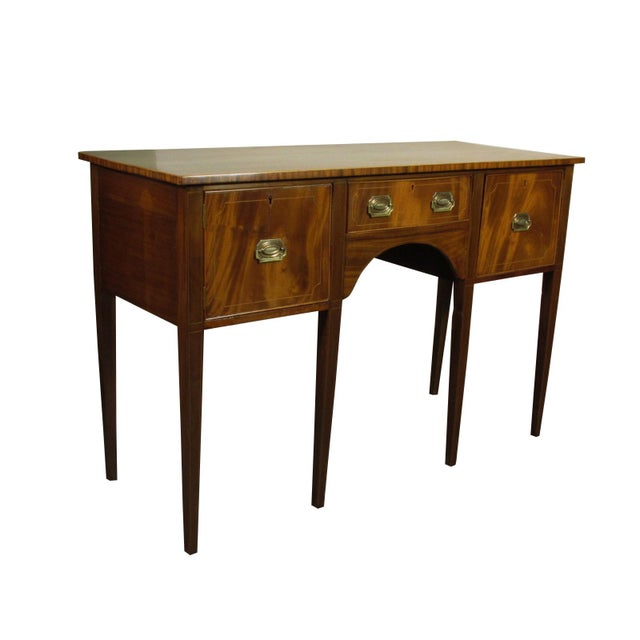 An early 20th-C. English Import mahogany sideboard with boxwood string inlay throughout, solid brass hardware and dovetail...