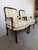 Elegant vintage Louis XV style French Provincial armchairs featuring beautifully carved walnut frames, graceful cabriole...