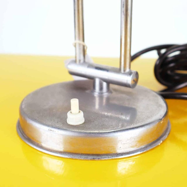 Vintage adjustable table lamp Height: 31 Diameter: 14 This piece is attributed to the mentioned designer/maker. It has no...