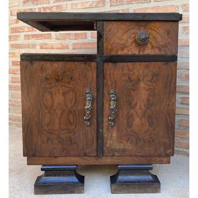 This pair of French Art Deco side cabinets from the circa 1930's could be used to flank a sofa or as nightstands. Each has...