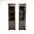 A wonderful and extremely rare pair of antique Edwardian lacquered chinoiserie display cabinets. They were made in...