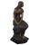 Antique bronze sculpture with beautiful patina, mounted on a black marble base, portraying the seated figure of a young...