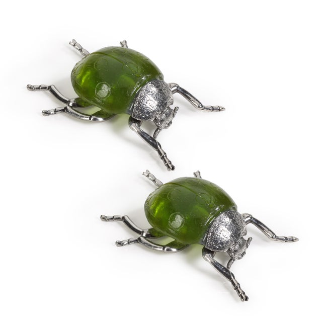 Add a dash of whimsy to your table or shelf decor with the Decorative Green Ladybug Figurines. This set of two features...
