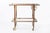 A refined and highly collectible mid-century modern bar cart designed by Cesare Lacca and produced by Cassina in Italy...