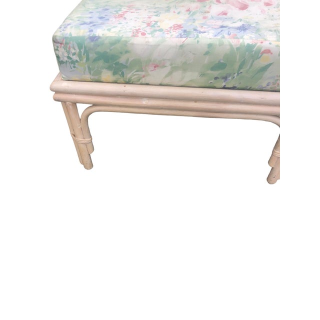 Pair of Vintage Cerused Rattan Chairs with a single matching footstool attributed to Ficks Reed. Extremely comfortable and...