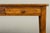 A late 19th-century French rustic farmhouse writing table crafted from solid pine, sourced in Provence, France. The table...