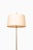 This tall floor lamp is made of golden brass and features the original lamp shade. I have official proof of authenticity...