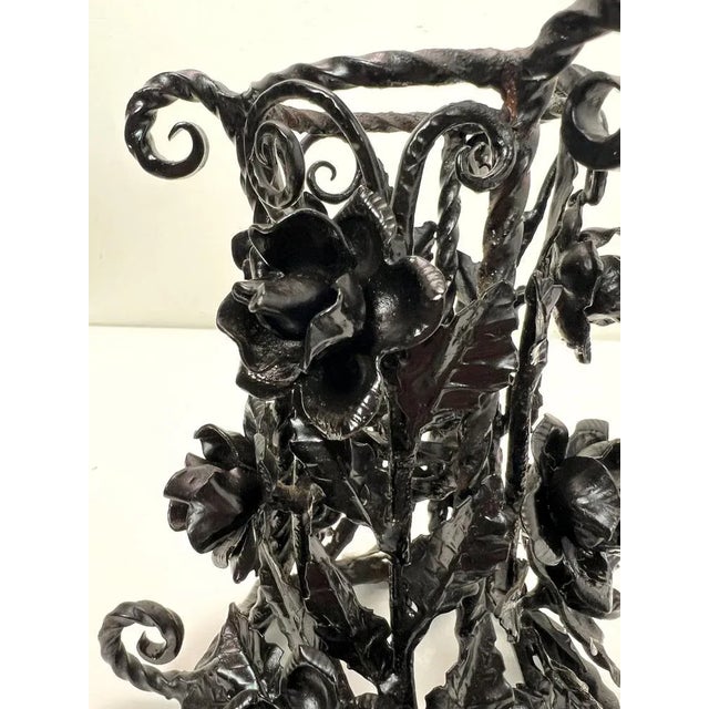 A beautiful wrought iron candlestick, probably by the hand of the Belgian artist Lodewijk van Boeckel. Very fine forged...
