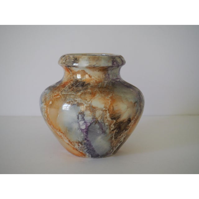 A beautiful example of an Arabia of Finland (Helsinki) vase circa 1930. The distinctive glaze mimics the colors and...