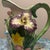 This charming majolica-style ceramic pitcher is a vintage piece from Fitz & Floyd, specifically dated to 1990. It features...