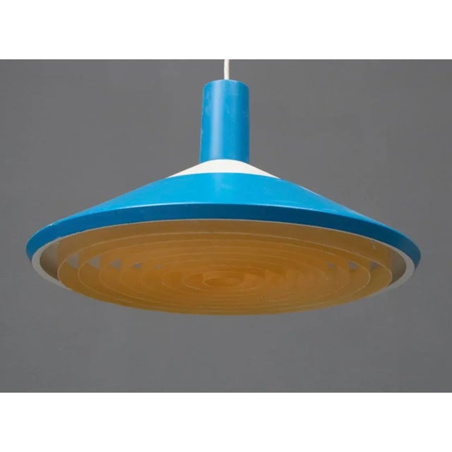 A great vintage classic from louis poulsen: class pendant with beautiful blue shade the pendant is in good used original...