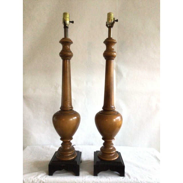 Pair of 1960s Wooden Lamps on Black Wood Base Turned wood is accented by a black base for these pair of lamps A perfect...