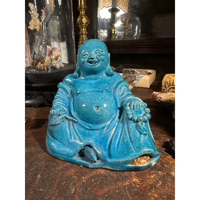Kangxi (K’ang Hsi) era 1662-1722 ceramic Buddha glazed in the turquoise blue the Kangxi era was famous for. There is a...