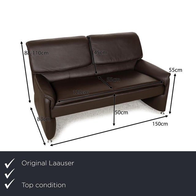 The Camaro sofa from Laauser is covered in dark brown leather and stands on almost floor-to-ceiling side panels that end...