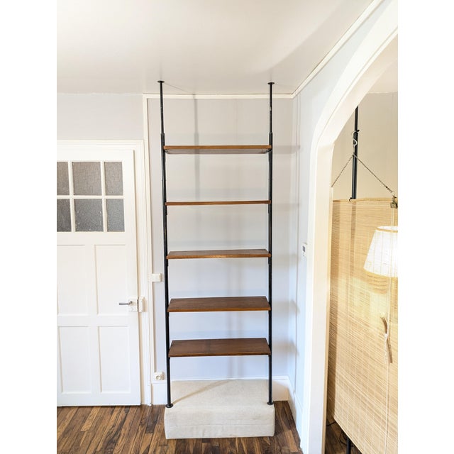 Dimensions: W85 x H230/260 x D24 cm. Modular shelving unit that installs between the floor and ceiling without tools. The...