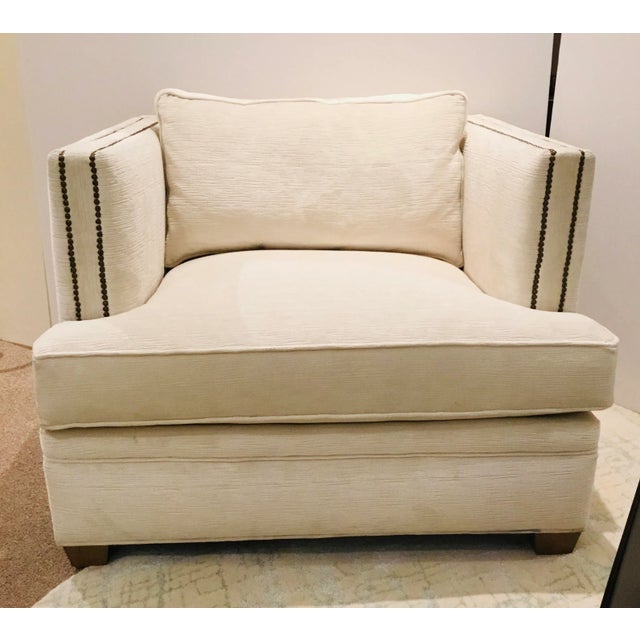 Stylish Caracole Modern Off-White Ribbed Chenille Club Chair, antique brass finished nailhead accents, showroom floor sample