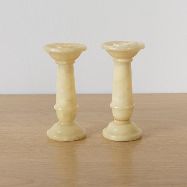 Wonderful pair of alabaster candlesticks from Italy, 1950s. Beautiful pale cream carved alabaster marble. Perfect as...