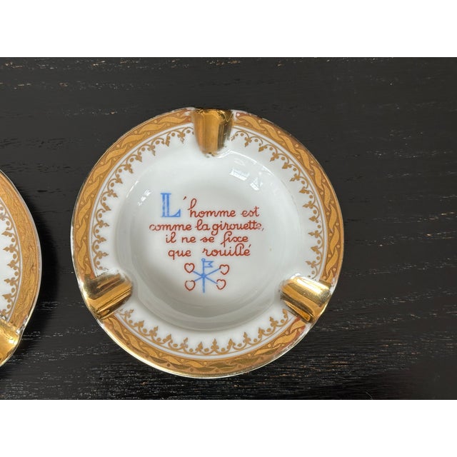 Add a whimsical French touch to your home decor with this set of two vintage Limoges ashtrays. The porcelain trays would...