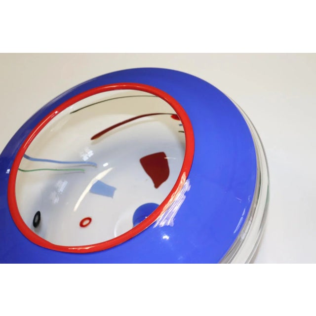 Kandinsky inspired hand blown Murano glass bowl with blue - transparent glass and multicolor "murrine", "ribbons" and...