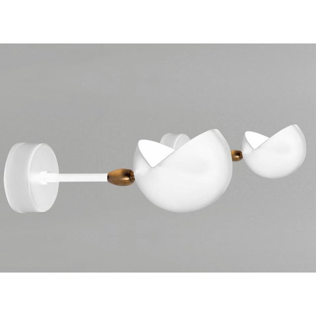 Sconce wall lamp model 'eye wall lamp' designed by serge mouille in 1956. manufactured by editions serge mouille in...