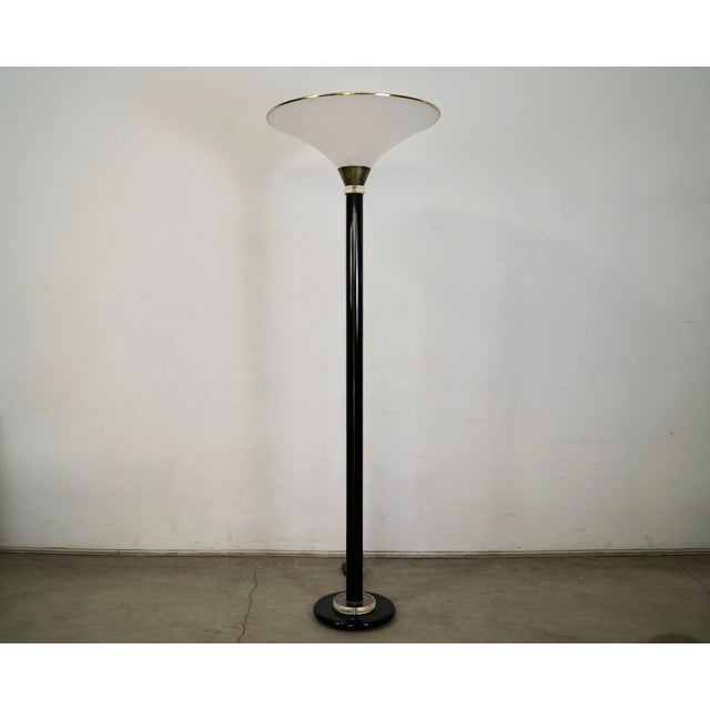 Vintage 1980's Hollywood Regency floor lamp for sale. Has an Art Deco design, and is made of metal, brass, and lucite. It...
