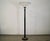 Vintage 1980's Hollywood Regency floor lamp for sale. Has an Art Deco design, and is made of metal, brass, and lucite. It...