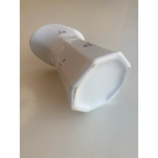 Antique ironstone floral design pitcher 5"H X 3.75"D , No makers mark in very good condition.