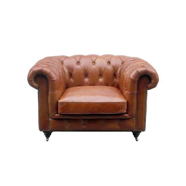 This Tufted Leather Chair adds an aura of luxury, and class to any room, and is a must have addition to any home furniture...