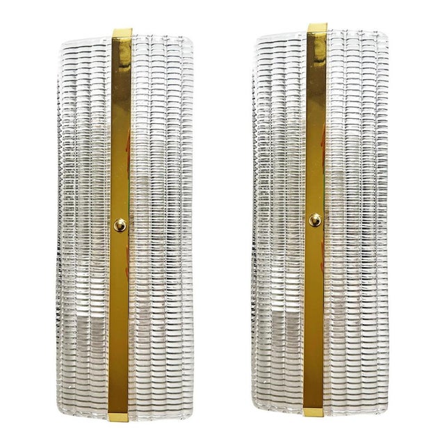 Set of two trasparent diamanted murano glass wall sconces with metal frame on view in brunish- brunito . murano glass with...