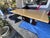 Fendi Casa Bernini Dining Table. Tabletop is wood with an epoxy coating and the base is chrome. Has some minor scratches...